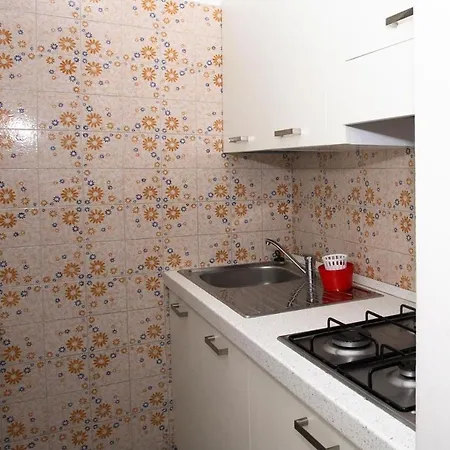 Two Storey Terraced House In A With A Pool *